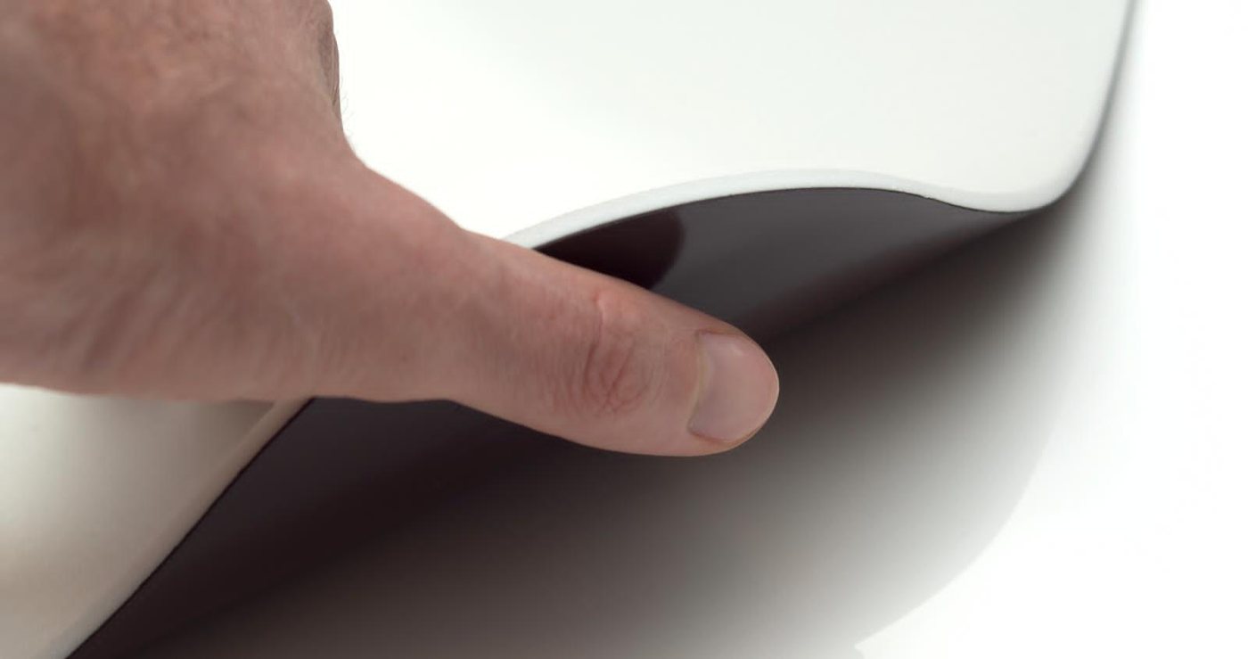 White PADS lifted to show the magnetic backing